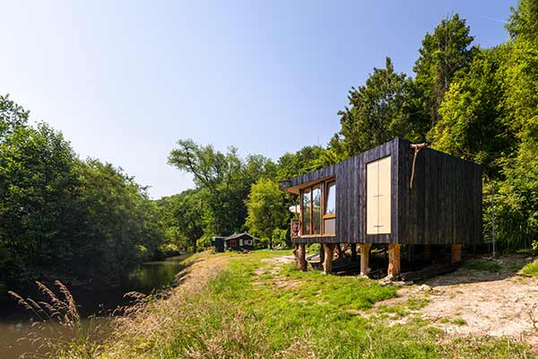 House on the shore, panelled with black wood