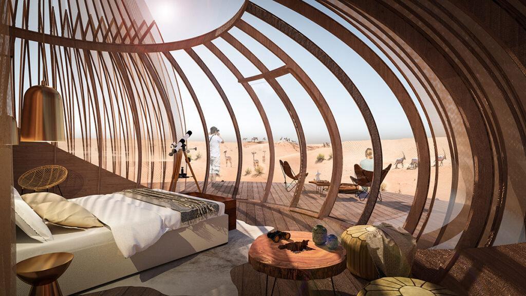 Wohnkapsel macht die Wüste wohnlich. Der geräumige Wohnbereich bietet herrliche Aussicht ins Freie. (Bild: AIDIA STUDIO)