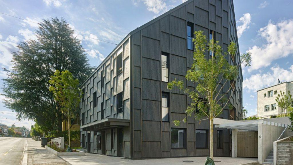 Das Haus L329 umfasst sieben Apartments, einen kleinen Gewerbebetrieb im Erdgeschoss und eine Tiefgarage im hinteren Bereich des Grundstücks. 