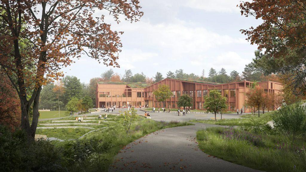 Lauvåsen Schule, Henrik Larsen: Rotbraunes Gebäude im grünen.